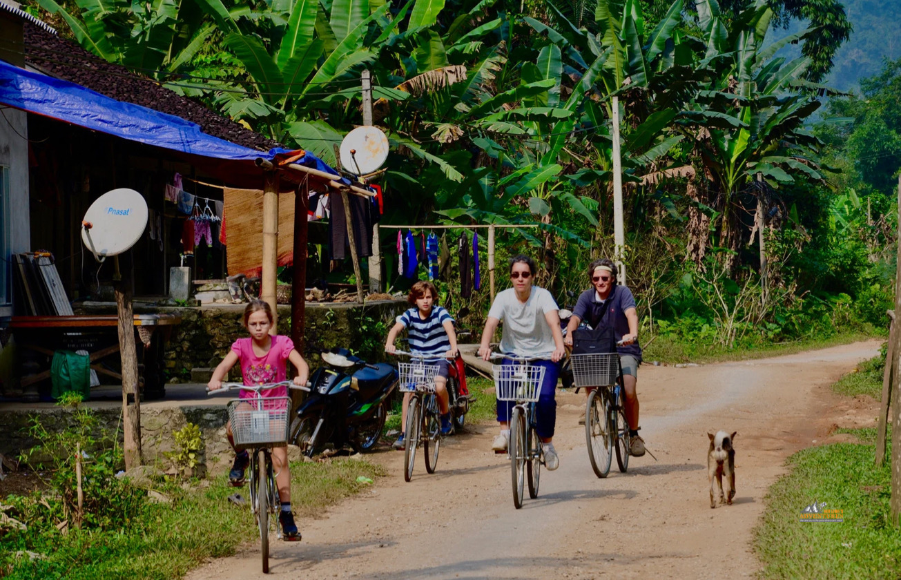Family cycling Ba Be National Park 2 days