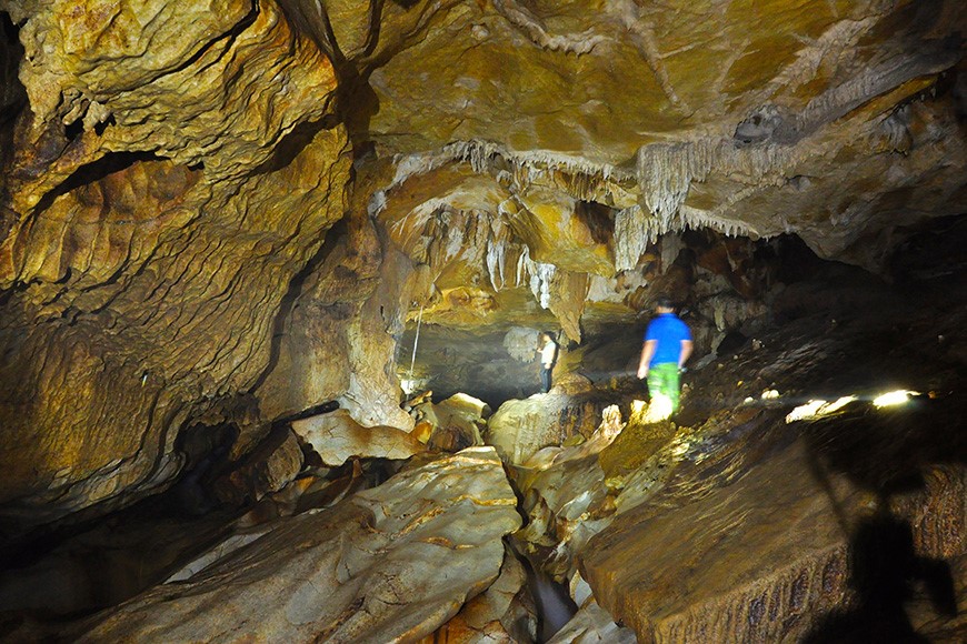 After the sump, a massive cave with rock formations
